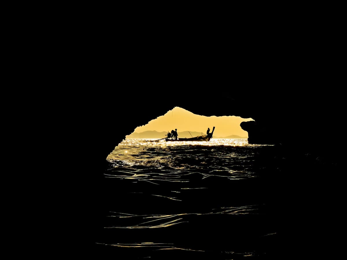 Long-tail boat at golden hour in Krabi, Thailand