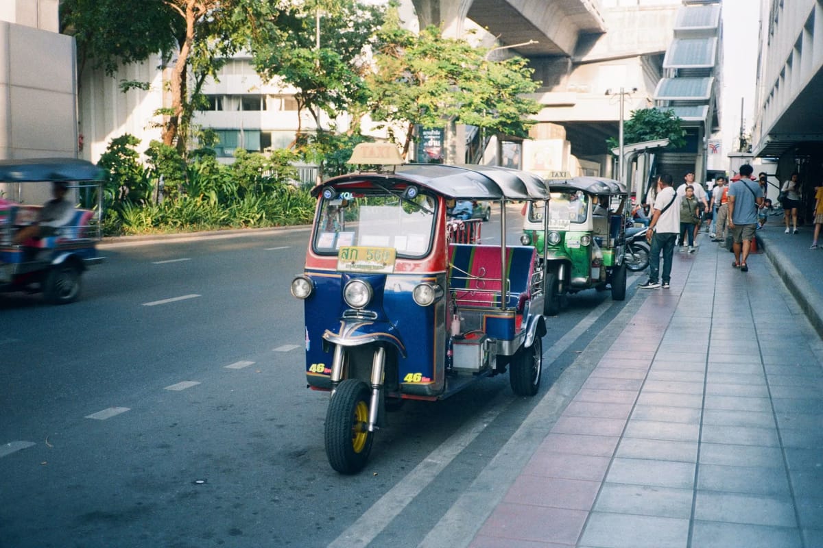 Three-wheeler taxi on a Bangkok street